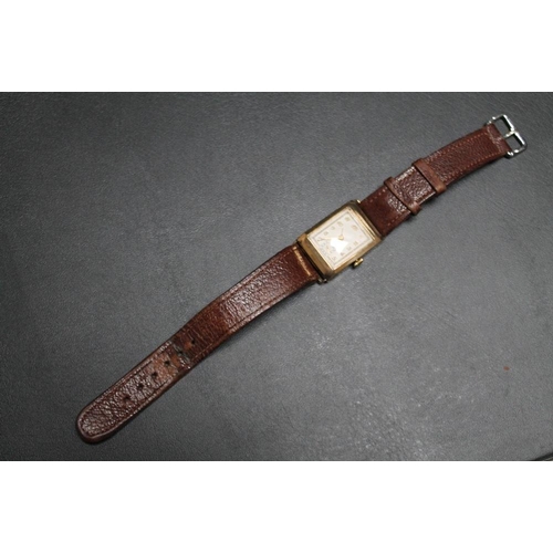 215 - A 1930'S STYLE ART DECO 9CT GOLD TANK TYPE 'CRUSADER' WRIST WATCH, on replacement leather strap, W 2... 