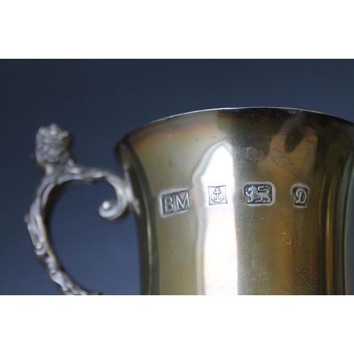 231 - A HEAVY HALLMARKED SILVER MUG BY THE BIRMINGHAM MINT - BIRMINGHAM 1978, with plaque and engraving, a... 