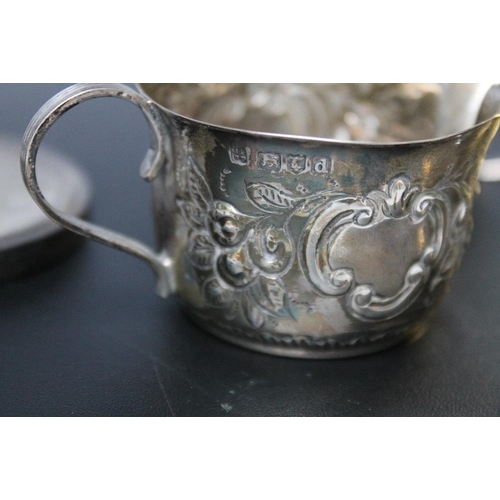 236 - A HALLMARKED SILVER SMALL CREAM JUG - LONDON 1899, approx weight 55.5g, together with a pepperette, ... 