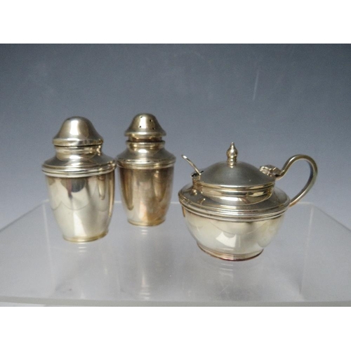 251 - A HALLMARKED SILVER THREE PIECE CRUET SET BIRMINGHAM 1972, makers mark A.T.C., consisting of salt, p... 