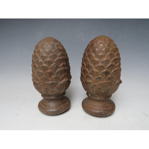 278 - A PAIR OF CAST PINEAPPLE FINIALS, H 20 cm (2)