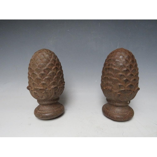 278 - A PAIR OF CAST PINEAPPLE FINIALS, H 20 cm (2)