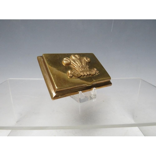 283 - A VICTORIAN BRASS TABLE SNUFF BOX, with Prince of Wales armorial, 5.5 cm x 8 cm