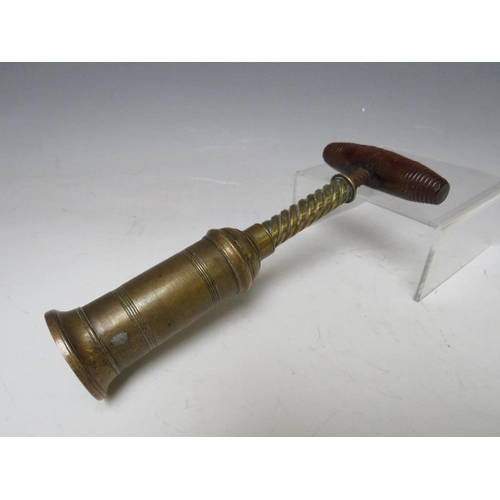 285 - A 19TH CENTURY BRASS PATENT CORKSCREW, with wooden handle