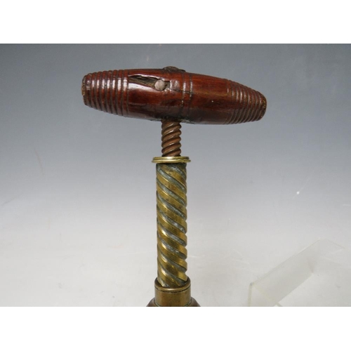 285 - A 19TH CENTURY BRASS PATENT CORKSCREW, with wooden handle