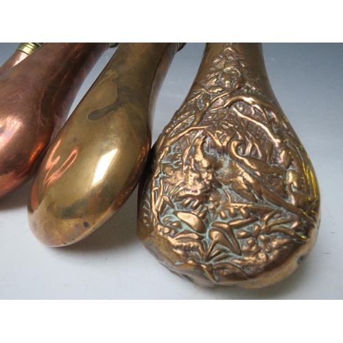 288 - FOUR 19TH CENTURY COPPER POWDER FLASKS, average L 20 cm