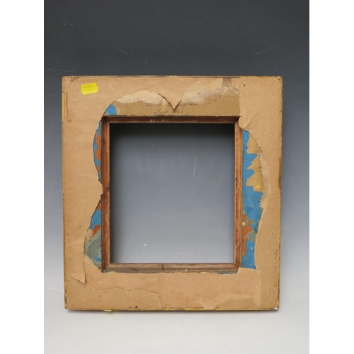 29 - A 19TH CENTURY DECORATIVE GOLD SWEPT FRAME, frame W 6.5 cm, rebate 23 x 20 cm