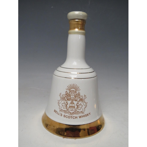 296 - A FINDLATER'S FIRST XI  BLENDED SCOTCH WHISKY AGED 11 YEARS CERAMIC FOOTBALL DECANTER AND CONTENTS, ... 