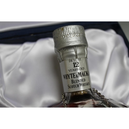 298 - AN UNOPENED PRESENTATION BOTTLING OF WHYTE & MACKAY 12 YEARS OLD WHISKY, to commemorate the Marriage... 