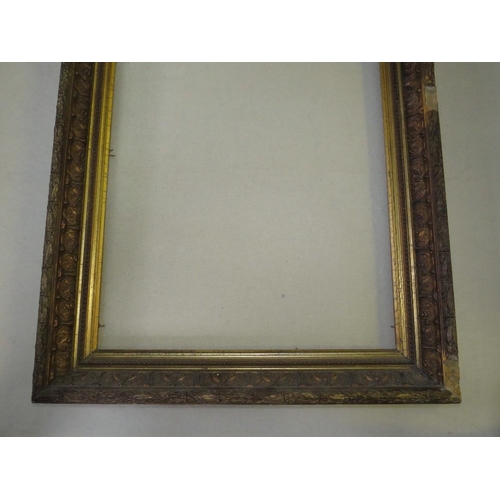 31 - A 19TH CENTURY GOLD FRAME, with leaf design to inner edge and acanthus leaf design to outer edge, fr... 