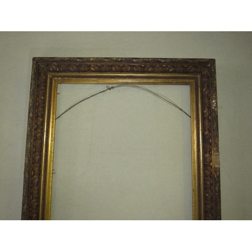 31 - A 19TH CENTURY GOLD FRAME, with leaf design to inner edge and acanthus leaf design to outer edge, fr... 