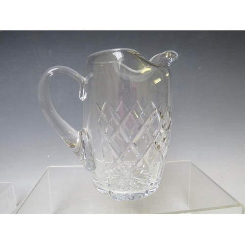 329 - A CARTIER CUT GLASS WATER JUG, engraved mark to star cut base, approx. H 15.2 cm