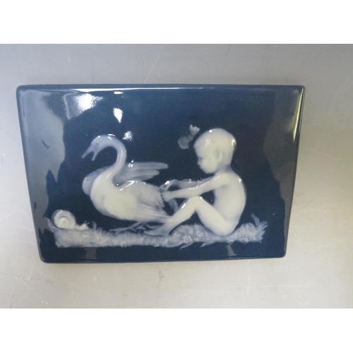 335 - A LIMOGES PATE SUR PATE PLAQUE SIGNED LEROUX, depicting a child, swan and snail, 10.5 x 16 cm