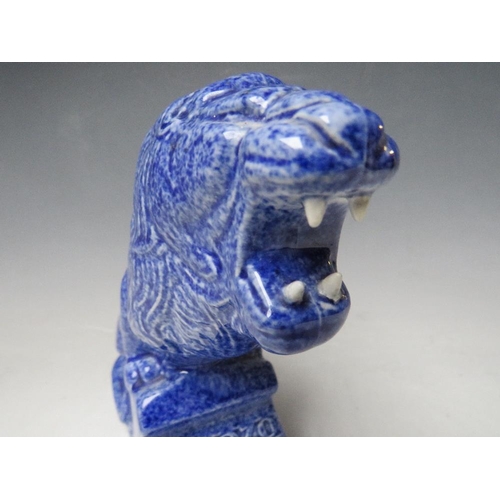 336 - AN ASHSTEAD POTTERS (1923-35) LION ADVERTISING FIGURE, for Genozo toothpaste, in a blue glaze, H 19 ... 