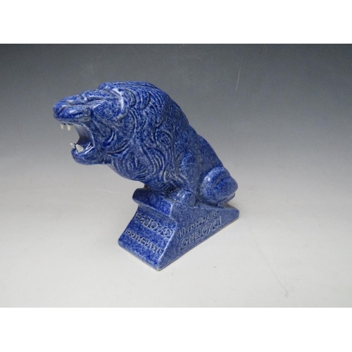 336 - AN ASHSTEAD POTTERS (1923-35) LION ADVERTISING FIGURE, for Genozo toothpaste, in a blue glaze, H 19 ... 