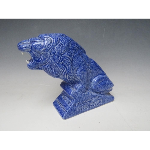 336 - AN ASHSTEAD POTTERS (1923-35) LION ADVERTISING FIGURE, for Genozo toothpaste, in a blue glaze, H 19 ... 