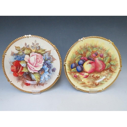 340 - A NEAR PAIR OF AYNSLEY CABINET PLATES SIGNED J.A. BAILEY AND N. BRUNT, the Bailey plate with flowers... 