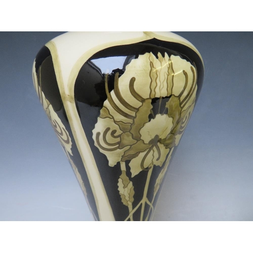 354 - A COBRIDGE TALL SLENDER BALUSTER VASE, decorated with panels of Art Nouveau flowers, on and ivory bo... 