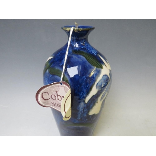 358 - A COBRIDGE TRIAL BALUSTER VASE, decorated with blue floral pattern, impressed factory marks, H 24 cm