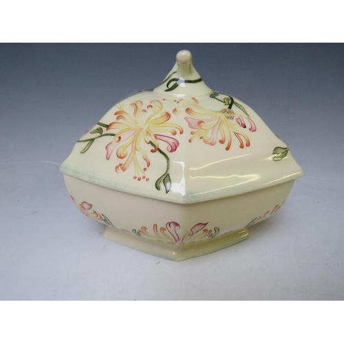 359 - A COBRIDGE TRIAL TUREEN AND LID, decorated with a floral pattern, impressed factory mark, signed K. ... 