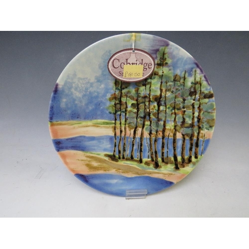 361 - A COBRIDGE CIRCULAR CHARGER BY S. JOHNSON, decorated with trees, impressed factory mark, limited edi... 