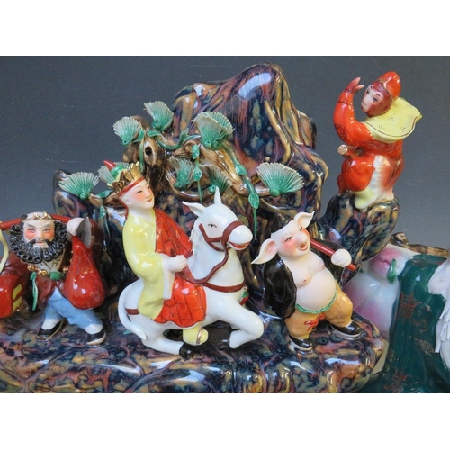 370 - A COLLECTION OF FIVE ASSORTED LARGE ORIENTAL PORCELAIN FIGURES, each dressed in traditional dress, i... 