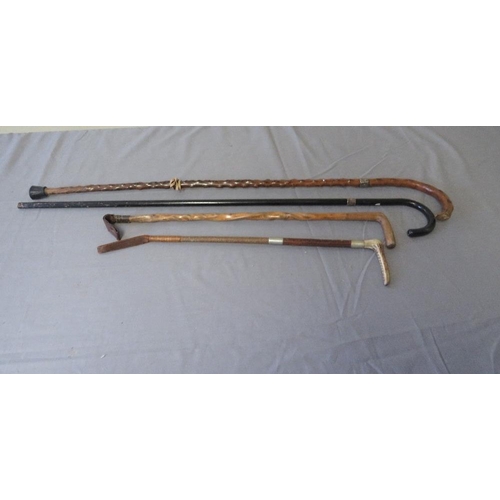 385 - TWO VINTAGE SILVER MOUNTED WALKING STICKS, average L 85 cm, together with two vintage riding crops, ... 