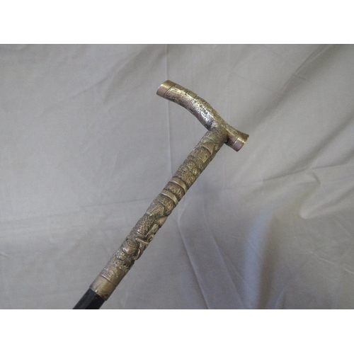 390 - A LATE 19TH / EARLY 20TH CENTURY WALKING STICK, with white metal ornate handle, L 81 cm