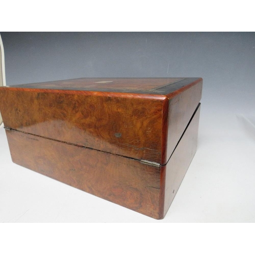 397 - A LATE 19TH WALNUT AND CROSSBANDED WRITING SLOPE. having a typical fitted interior, W 35.5 cm