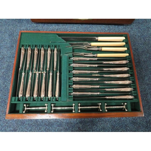 398 - AN EXTENSIVE WALNUT CASED CANTEEN OF PLATED CUTLERY, twelve place setting, approximately 107 pieces