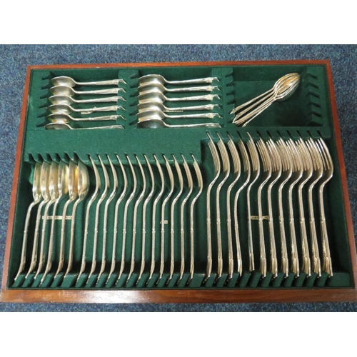 398 - AN EXTENSIVE WALNUT CASED CANTEEN OF PLATED CUTLERY, twelve place setting, approximately 107 pieces