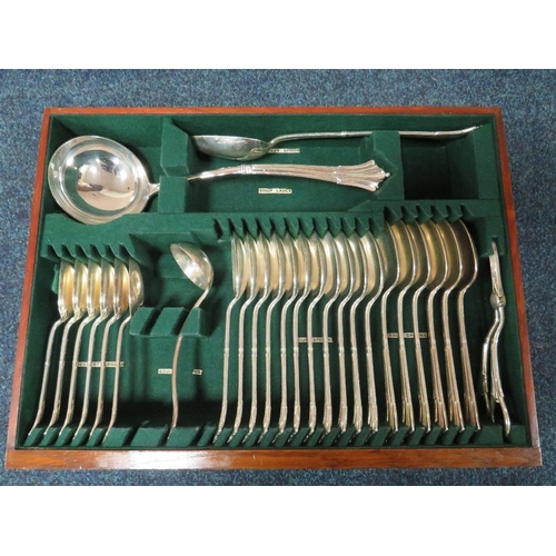 398 - AN EXTENSIVE WALNUT CASED CANTEEN OF PLATED CUTLERY, twelve place setting, approximately 107 pieces