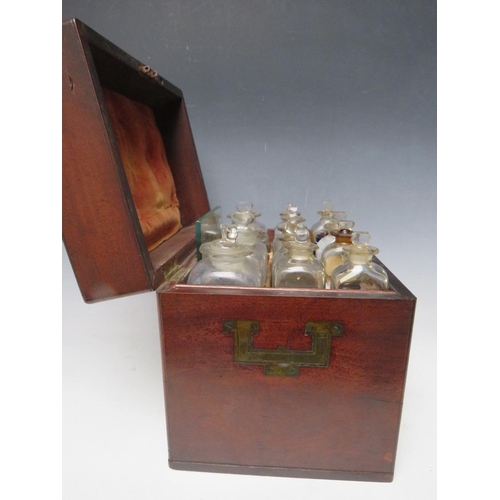 400 - A GEORGE III MAHOGANY APOTHECARY BOX, with drawer at base, containing various bottles and equipment,... 