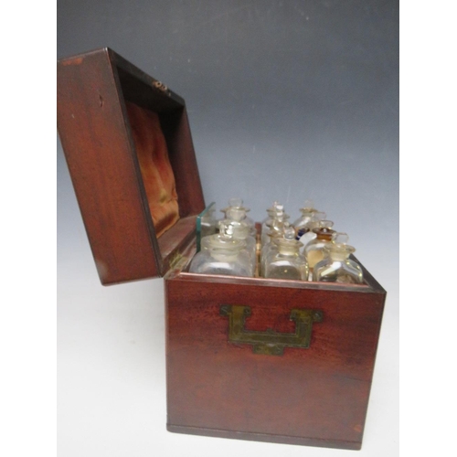 400 - A GEORGE III MAHOGANY APOTHECARY BOX, with drawer at base, containing various bottles and equipment,... 