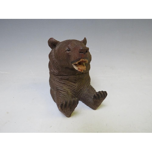 403 - A BLACK FOREST SEATED BEAR INKWELL, the head hinging to reveal a glass inkwell, H 8.5 cm