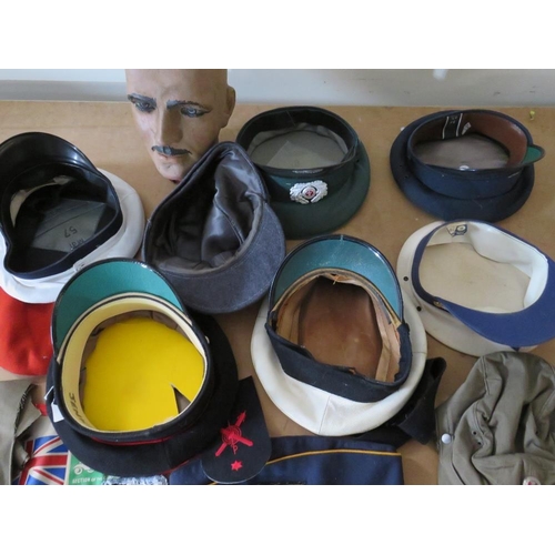 428 - A COLLECTION OF VARIOUS MILITARY CAPS AND BERETS ETC., to include Naval and German types, along with... 