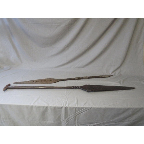 436 - A LARGE INDONESIAN DAYAK BORNEO CARVED CANOE PADDLE, and a West African Benin tribal paddle (2)