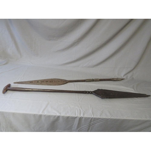 436 - A LARGE INDONESIAN DAYAK BORNEO CARVED CANOE PADDLE, and a West African Benin tribal paddle (2)