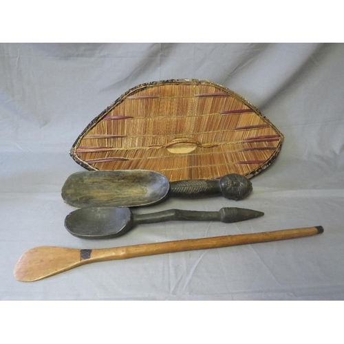 437 - AN EAST AFRICAN UGANDA GANDA WICKER SHIELD WITH HANDLE, a large Zulu porridge spoon, a West African ... 