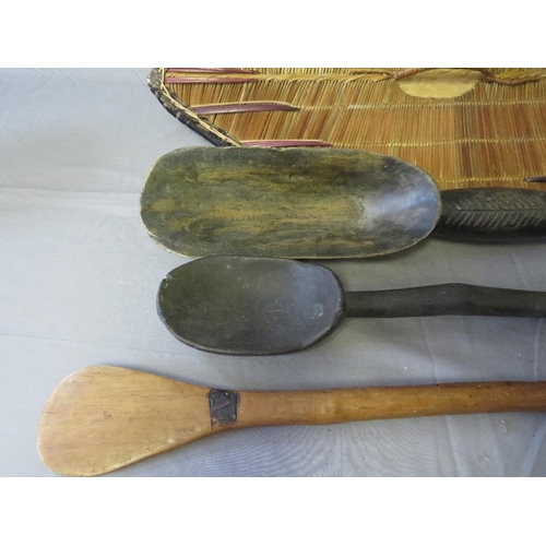 437 - AN EAST AFRICAN UGANDA GANDA WICKER SHIELD WITH HANDLE, a large Zulu porridge spoon, a West African ... 