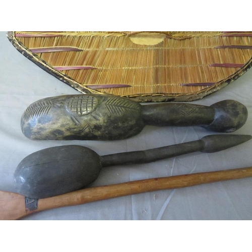 437 - AN EAST AFRICAN UGANDA GANDA WICKER SHIELD WITH HANDLE, a large Zulu porridge spoon, a West African ... 