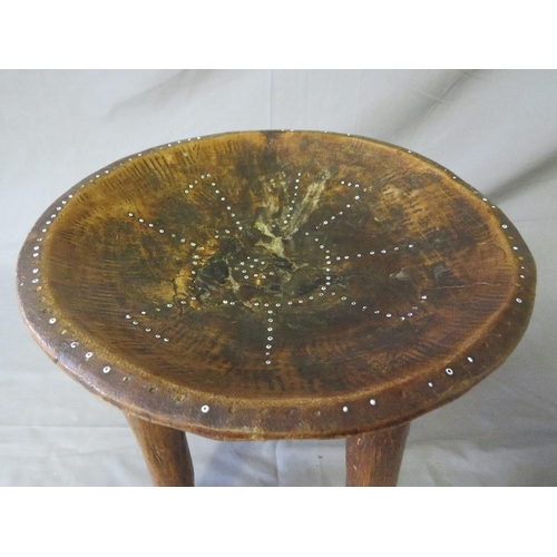 439 - EAST AFRICAN KENYAN LUO STOOL WITH FOUR FEET, the top inlaid with white trade beads