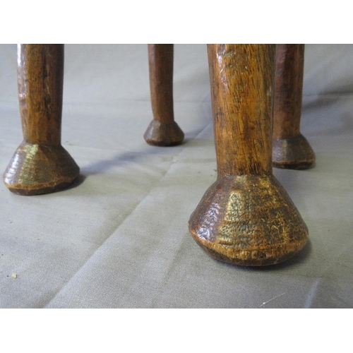 439 - EAST AFRICAN KENYAN LUO STOOL WITH FOUR FEET, the top inlaid with white trade beads