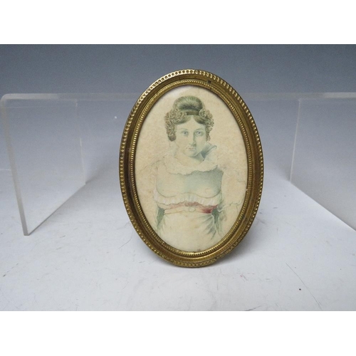 44 - A 19TH CENTURY OVAL PORTRAIT MINIATURE OF A YOUNG WOMAN, unsigned, watercolour on paper, framed and ... 