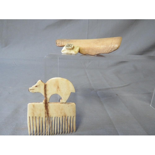 441 - A 19TH CENTURY NORTH AMERICAN INUIT CARVED WRIST GUARD, Arctic fox comb and parka toggle