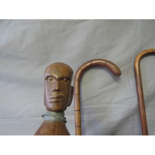 444 - TWO WALKING STICKS, A SWAGGER STICK MARKED EGYPT 44, a leather whip and African walking cane