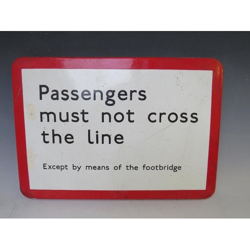 447 - A VINTAGE 'PASSENGERS MUST NOT CROSS THE LINE EXCEPT BY MEANS OF THE FOOTBRIDGE' ENAMEL SIGN, 32.5 x... 