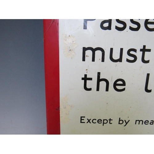 447 - A VINTAGE 'PASSENGERS MUST NOT CROSS THE LINE EXCEPT BY MEANS OF THE FOOTBRIDGE' ENAMEL SIGN, 32.5 x... 