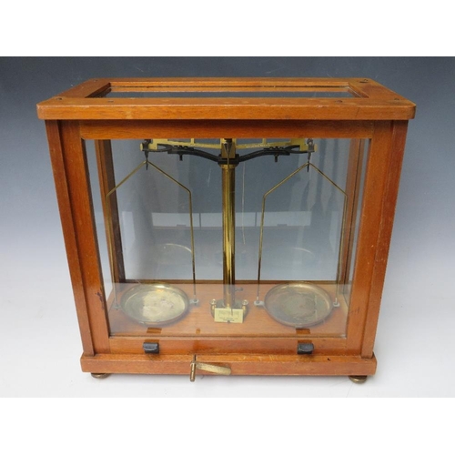 456 - A SET OF PHILIP HARRIS OF BIRMINGHAM BALANCE SCALES, in glazed mahogany case