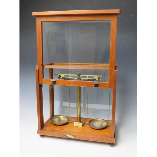 456 - A SET OF PHILIP HARRIS OF BIRMINGHAM BALANCE SCALES, in glazed mahogany case